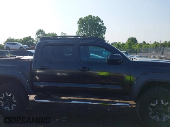 2017 Toyota Tacoma SR5 with VIN 3TMCZ5ANXHM099610, listed as a IAAI auction lot 42441050 with 85,046 mi miles and . Bid and sale history available at DreamBid. Image 13.