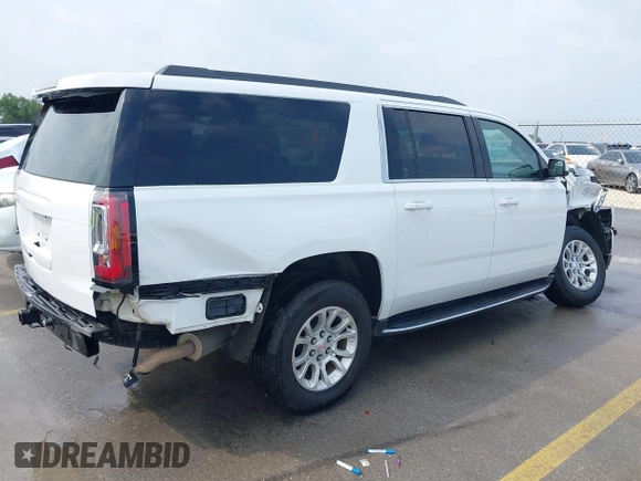 2019 GMC Yukon XL SLT with VIN 1GKS2GKC4KR160002, listed as a IAAI auction lot 42125427 with 119,312 mi miles and . Bid and sale history available at DreamBid. Image 4.