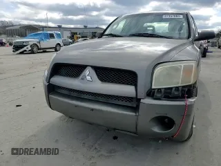2007 Mitsubishi Raider LS z VIN 1Z7HT28K27S243579, wystawiony jako Copart lot #87357884 z przebiegiem 236 753 mil mil oraz Czysty tytuł • Clean title. Historia ofert i sprzedaży dostępna na DreamBid. Obrazek 11.
