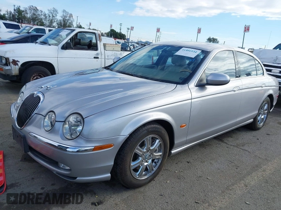 2003 Jaguar S-Type with VIN SAJEA01T83FM48713, listed as a IAAI auction lot 41402152 with 142,875 mi miles and . Bid and sale history available at DreamBid. Image 2.