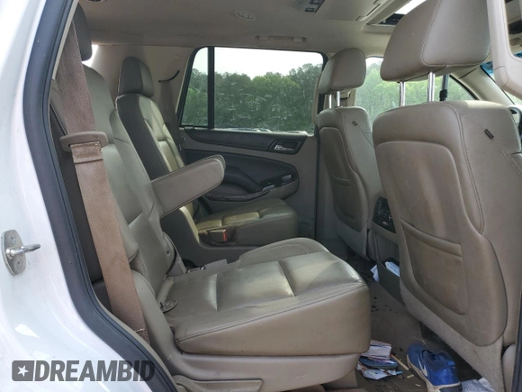 2015 Chevrolet Tahoe LT z VIN 1GNSCBKC7FR294141, wystawiony jako Copart lot #52937095 z przebiegiem 232 473 mil mil oraz Szkoda całkowita • Salvage title. Historia ofert i sprzedaży dostępna na DreamBid. Obrazek 11.