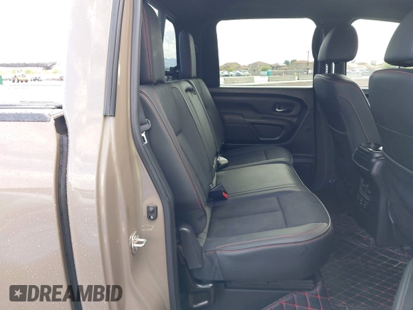 2021 Nissan Titan Pro-4X with VIN 1N6AA1ED9MN519749, listed as a IAAI auction lot 41948962 with 65,807 mi miles and . Bid and sale history available at DreamBid. Image 8.