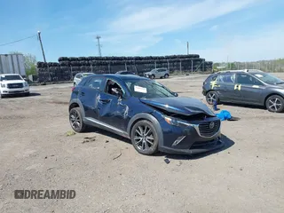 2016 Mazda CX-3 Grand Touring z VIN JM1DKBD78G0126132, wystawiony jako IAAI lot #42099258 z przebiegiem 70 159 mil mil oraz . Historia ofert i sprzedaży dostępna na DreamBid. Obrazek 1.