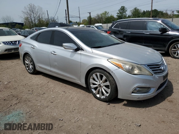 2012 Hyundai Azera z VIN KMHFH4JGXCA173752, wystawiony jako Copart lot #54708955 z przebiegiem 177 711 mil mil oraz Czysty tytuł • Clean title. Historia ofert i sprzedaży dostępna na DreamBid. Obrazek 4.