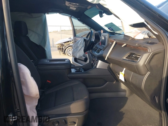 2024 Chevrolet Suburban LS with VIN 1GNSCBKD7RR221946, listed as a IAAI auction lot 40988374 with 19,394 mi miles and . Bid and sale history available at DreamBid. Image 5.