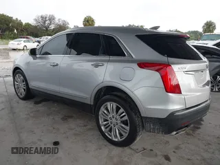 2018 Cadillac XT5 Premium Luxury FWD z VIN 1GYKNERS7JZ214504, wystawiony jako IAAI lot #40067507 z przebiegiem Nie podano mil oraz . Historia ofert i sprzedaży dostępna na DreamBid. Obrazek 3.