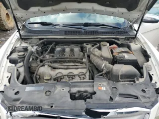 2012 Ford Taurus Limited z VIN 1FAHP2FW0CG126852, wystawiony jako Copart lot #56157325 z przebiegiem 222 514 mil mil oraz Szkoda całkowita • Salvage title. Historia ofert i sprzedaży dostępna na DreamBid. Obrazek 11.