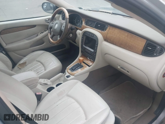 2004 Jaguar X-Type z VIN SAJEA51CX4WE01300, wystawiony jako IAAI lot #42514993 z przebiegiem 95 525 mil mil oraz . Historia ofert i sprzedaży dostępna na DreamBid. Obrazek 5.