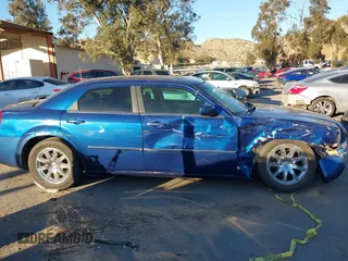 2009 Chrysler 300 Touring with VIN 2C3LA53V89H565270, listed as a IAAI auction lot 41069505 with 112,830 mi miles. Bid and sale history available at carsss.com. Image 13.