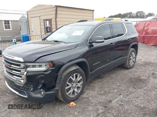 2021 GMC Acadia SLT with VIN 1GKKNMLS0MZ209789, listed as a IAAI auction lot 41521978 with 104,690 mi miles. Bid and sale history available at carsss.com. Image 17.