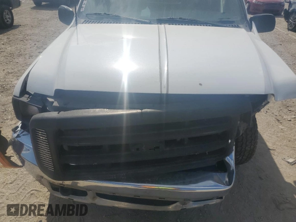 2000 Ford F-250 XL z VIN 1FTNF20L0YEA92980, wystawiony jako Copart lot #56422575 z przebiegiem 210 425 mil mil oraz Szkoda całkowita • Salvage title. Historia ofert i sprzedaży dostępna na DreamBid. Obrazek 11.