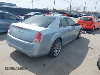 2013 Chrysler 300 with VIN 2C3CCAGT9DH590053, listed as a IAAI auction lot 41800253 with 136,596 mi miles. Bid and sale history available at carsss.com. Image 4.