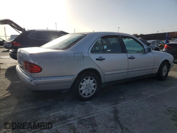 1998 Mercedes-Benz E 320 with VIN WDBJF25F3WA689755, listed as a Copart auction lot 51288455 with 124,157 mi miles and Salvage Title. Bid and sale history available at DreamBid. Image 3.