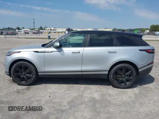 2020 Land Rover Range Rover Velar S z VIN SALYB2EXXLA255258, wystawiony jako IAAI lot #41823002 z przebiegiem 66 527 mil mil oraz . Historia ofert i sprzedaży dostępna na DreamBid. Obrazek 15.