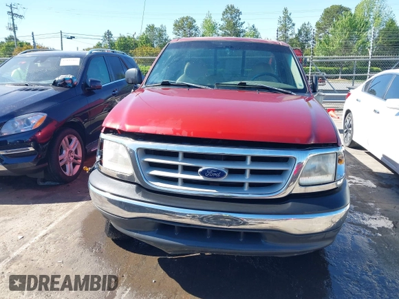 1999 Ford F-150 with VIN 1FTZF1723XNA23062, listed as a IAAI auction lot 42019826 with 232,648 mi miles and . Bid and sale history available at DreamBid. Image 12.