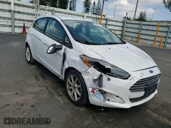 2019 Ford Fiesta SE z VIN 3FADP4EJ5KM106732, wystawiony jako Copart lot #55856145 z przebiegiem 79 778 mil mil oraz Szkoda całkowita • Salvage title. Historia ofert i sprzedaży dostępna na DreamBid. Obrazek 13.