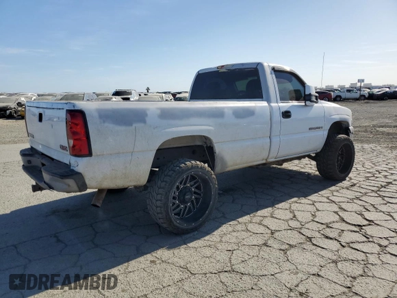 2002 GMC Sierra 2500HD SLE z VIN 1GTHC24G22E267031, wystawiony jako Copart lot #58606335 z przebiegiem Nie podano mil oraz Szkoda całkowita • Salvage title. Historia ofert i sprzedaży dostępna na DreamBid. Obrazek 3.