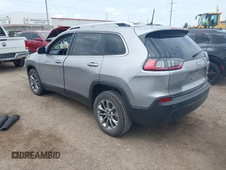 2021 Jeep Cherokee Altitude with VIN 1C4PJLLB2MD164004, listed as a IAAI auction lot 42083946 with 99,136 mi miles and . Bid and sale history available at DreamBid. Image 3.