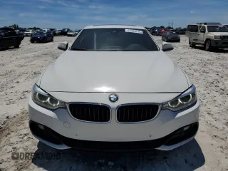 2017 BMW 4 Series 430i xDrive with VIN WBA4R9C3XHK878808, listed as a Copart auction lot 58300774 with 145,067 mi miles and Salvage Title. Bid and sale history available at DreamBid. Image 5.
