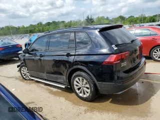 2018 Volkswagen Tiguan S с VIN 3VV0B7AX2JM105105, выставлен на аукционе Copart как лот 55282085 с пробегом 153 133 миль миль и На запчасти • Non repairable. История ставок и продаж доступна на DreamBid. Изображение 2.