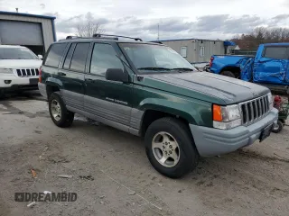 1998 Jeep Grand Cherokee Laredo with VIN 1J4GZ58S3WC152962, listed as a Copart auction lot 79333864 with 0 mi miles and Clean Title. Bid and sale history available at carsss.com. Image 4.