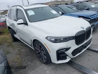 2022 BMW X7 xDrive40i with VIN 5UXCW2C08N9K77869, listed as a IAAI auction lot 41517836 with 26,153 mi miles. Bid and sale history available at carsss.com. Image 1.