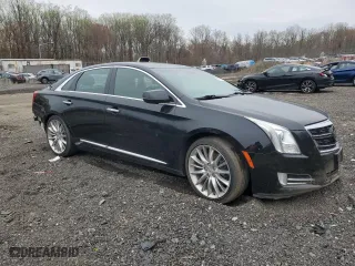 2014 Cadillac XTS Platinum with VIN 2G61W5S83E9161753, listed as a Copart auction lot 50337075 with 37,867 mi miles and Salvage Title. Bid and sale history available at carsss.com. Image 4.