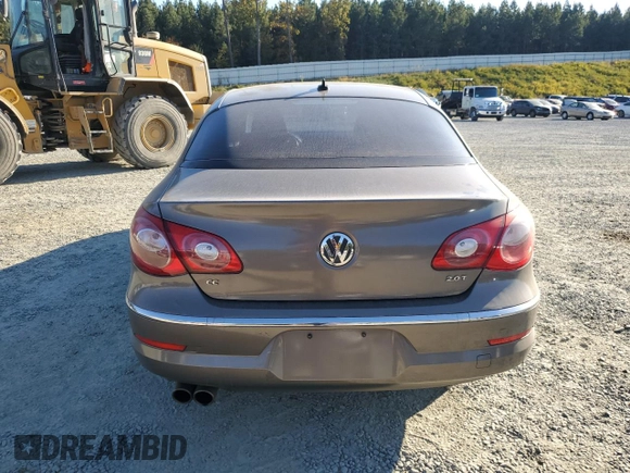 2010 Volkswagen CC Sport with VIN WVWMN7AN3AE541988, listed as a Copart auction lot 77670794 with 100,277 mi miles and Salvage Title. Bid and sale history available at DreamBid. Image 6.