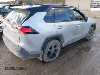 2021 Toyota RAV4 Hybrid XSE with VIN 4T3E6RFV8MU059858, listed as a IAAI auction lot 41423611 with 14,281 mi miles and . Bid and sale history available at DreamBid. Image 4.