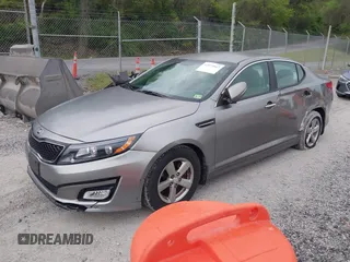 2014 Kia Optima LX with VIN 5XXGM4A73EG277964, listed as a IAAI auction lot 42079663 with 91,009 mi miles. Bid and sale history available at carsss.com. Image 18.