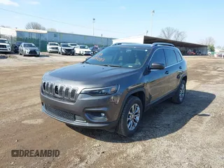 2019 Jeep Cherokee Latitude Plus with VIN 1C4PJMLBXKD162570, listed as a IAAI auction lot 41897313 with 142,110 mi miles. Bid and sale history available at carsss.com. Image 2.