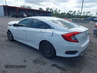2020 Honda Civic LX z VIN 2HGFC2F65LH531818, wystawiony jako IAAI lot #41997104 z przebiegiem 68 878 mil mil oraz . Historia ofert i sprzedaży dostępna na DreamBid. Obrazek 3.