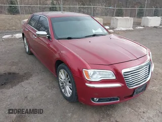 2012 Chrysler 300 C with VIN 2C3CCAKT4CH217217, listed as a IAAI auction lot 41502473 with 193,258 mi miles and . Bid and sale history available at DreamBid. Image 1.