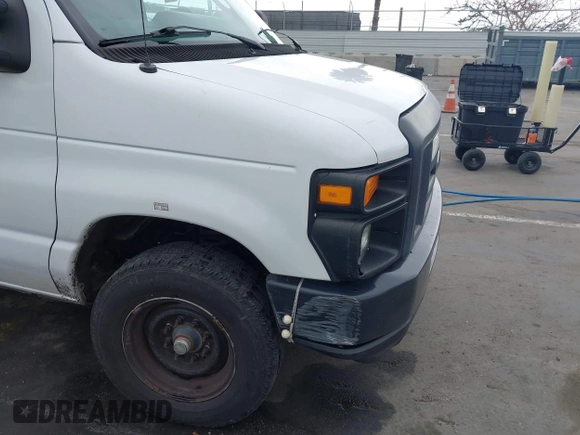 2014 Ford Econoline Cargo Commercial with VIN 1FTNE1EWXEDA18404, listed as a IAAI auction lot 42173934 with 188,301 mi miles and . Bid and sale history available at DreamBid. Image 6.