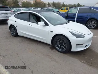 2023 Tesla Model 3 with VIN 5YJ3E1EA5PF505856, listed as a IAAI auction lot 41885837 with 28,206 mi miles and . Bid and sale history available at carsss.com. Image 1.