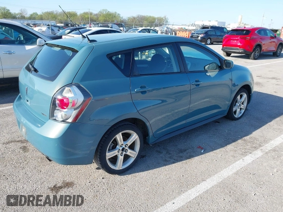 2009 Pontiac Vibe w/1SB with VIN 5Y2SP67049Z444326, listed as a IAAI auction lot 41992889 with 215,761 mi miles. Bid and sale history available at carsss.com. Image 4.