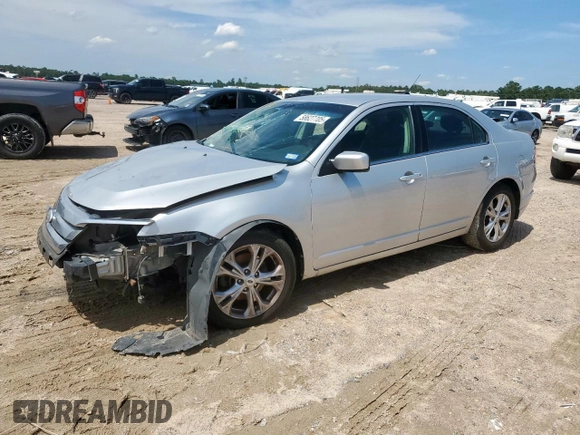 2012 Ford Fusion SE z VIN 3FAHP0HG8CR145183, wystawiony jako Copart lot #58627705 z przebiegiem 236 148 mil mil oraz Szkoda całkowita • Salvage title. Historia ofert i sprzedaży dostępna na DreamBid. Obrazek 1.