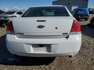 2012 Chevrolet Impala Police Police with VIN 2G1WD5E32C1309839, listed as a Copart auction lot 44011485 with 142,353 mi miles and Salvage Title. Bid and sale history available at carsss.com. Image 6.