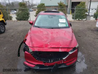 2017 Mazda CX-5 Grand Touring with VIN JM3KFBDL0H0177495, listed as a IAAI auction lot 41722655 with 58,972 mi miles. Bid and sale history available at carsss.com. Image 6.