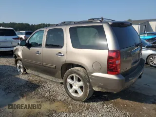 2011 Chevrolet Tahoe LS with VIN 1GNSCAE00BR395849, listed as a Copart auction lot 54750685 with 183,336 mi miles and Salvage title. Bid and sale history available at DreamBid. Image 2.