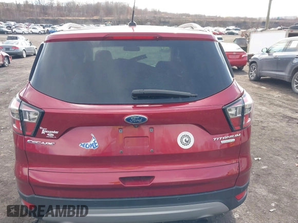 2017 Ford Escape Titanium with VIN 1FMCU0JD9HUC71738, listed as a IAAI auction lot 41673228 with 173,615 mi miles. Bid and sale history available at carsss.com. Image 16.