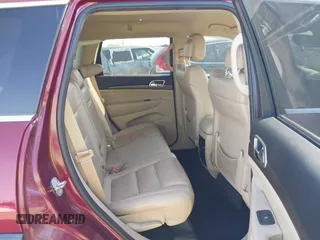 2017 Jeep Grand Cherokee Laredo with VIN 1C4RJEAG4HC674921, listed as a IAAI auction lot 41876971 with 115,773 mi miles. Bid and sale history available at carsss.com. Image 8.