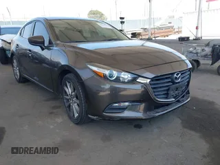 2017 Mazda 3 Touring z VIN 3MZBN1V79HM136753, wystawiony jako IAAI lot #42203136 z przebiegiem 109 210 mil mil oraz . Historia ofert i sprzedaży dostępna na DreamBid. Obrazek 1.