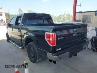 2014 Ford F-150 XL with VIN 1FTFW1CF1EFA41871, listed as a IAAI auction lot 42060338 with 134,591 mi miles. Bid and sale history available at carsss.com. Image 3.