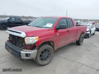 2014 Toyota Tundra 4WD Truck SR with VIN 5TFUW5F1XEX415595, listed as a IAAI auction lot 41426947 with 145,641 mi miles. Bid and sale history available at carsss.com. Image 19.