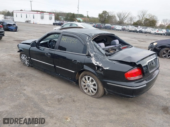 2004 Hyundai Sonata GLS with VIN KMHWF35HX4A068682, listed as a IAAI auction lot 41933856 with 127,508 mi miles. Bid and sale history available at carsss.com. Image 3.