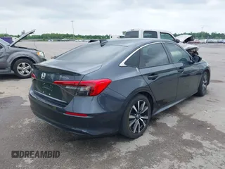 2023 Honda Civic EX with VIN 2HGFE1F73PH312228, listed as a IAAI auction lot 42185408 with 19,339 mi miles and . Bid and sale history available at DreamBid. Image 4.