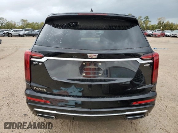 2021 Cadillac XT6 Luxury z VIN 1GYKPAR43MZ126493, wystawiony jako Copart lot #83555174 z przebiegiem 37 744 mil mil oraz Szkoda całkowita • Salvage title. Historia ofert i sprzedaży dostępna na DreamBid. Obrazek 6.