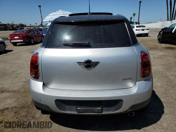 2012 MINI Countryman with VIN WMWZB3C58CWM02843, listed as a Copart auction lot 52131715 with Not Provided miles and Salvage Title. Bid and sale history available at DreamBid. Image 6.
