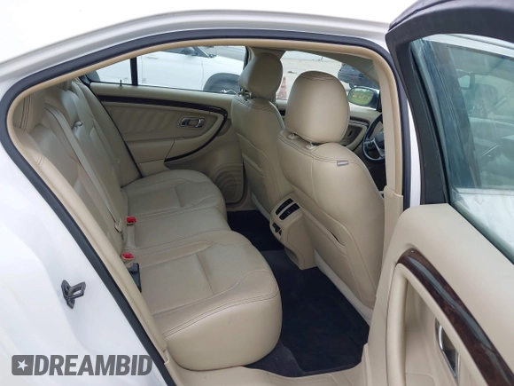 2013 Ford Taurus Limited with VIN 1FAHP2F8XDG127848, listed as a IAAI auction lot 42498773 with 103,299 mi miles and . Bid and sale history available at DreamBid. Image 8.